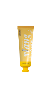 A soft yellow, squeeze tube bottle on a white background